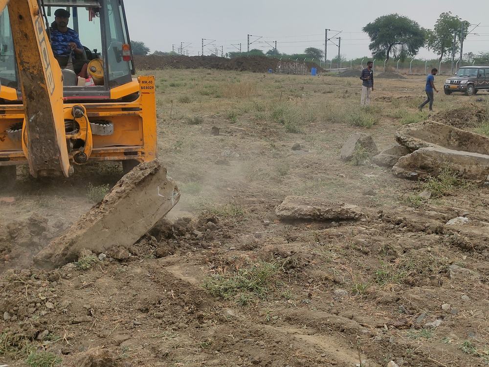 Site clearing and preparation with an excavator