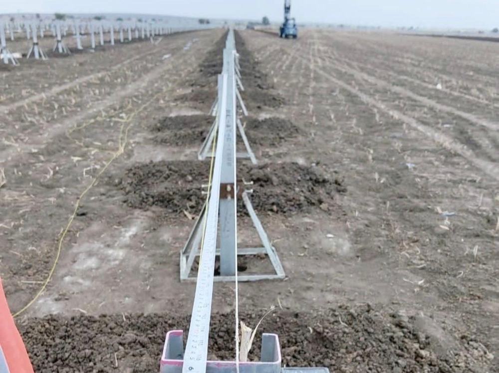 String line and tape used for solar pile alignment